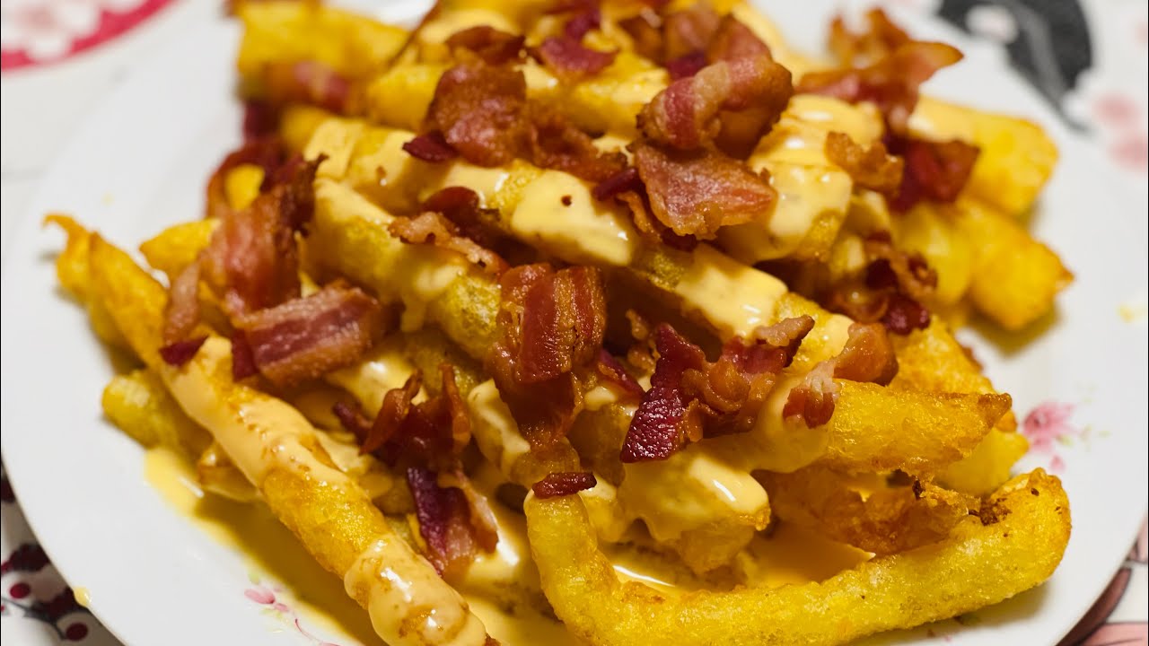 Patate con fonduta di cheddar e bacon
